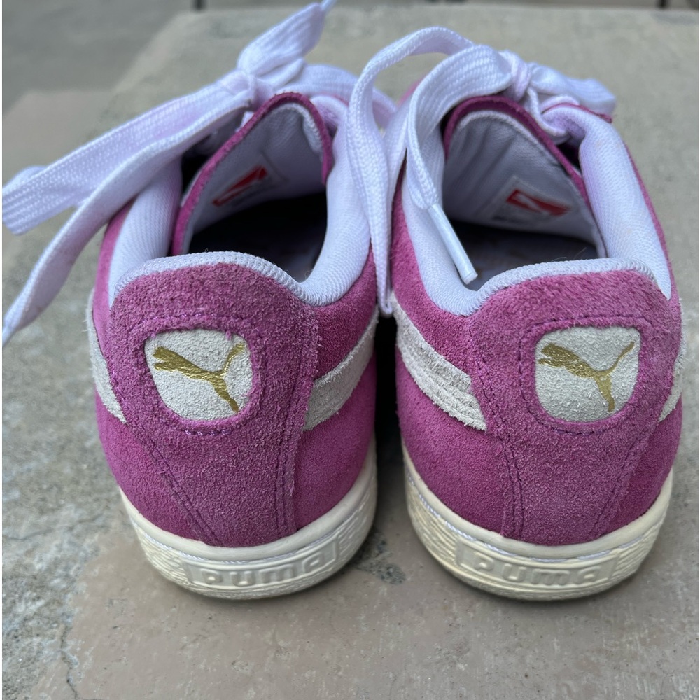 Puma pink suede sneakers.